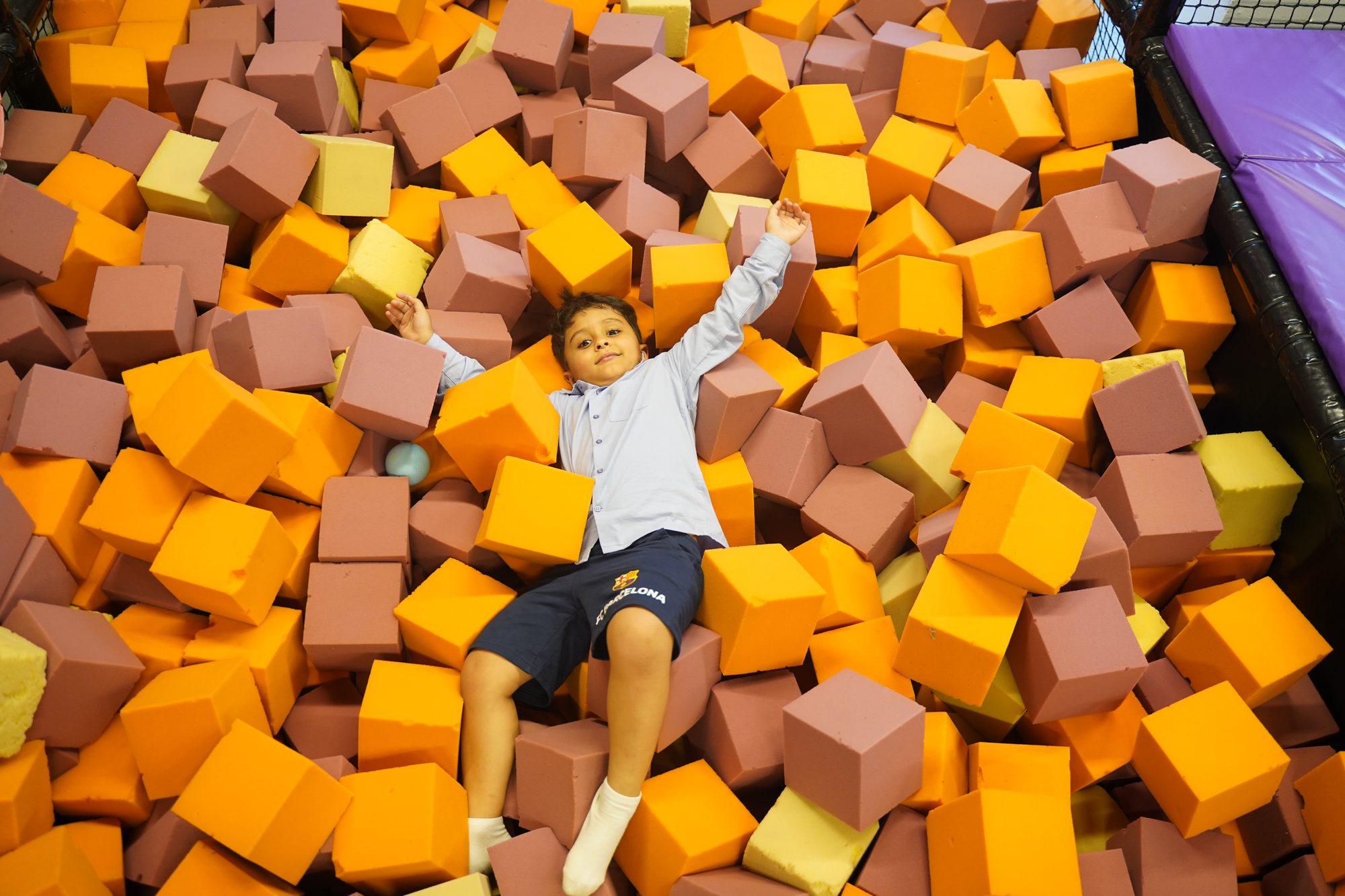 Boy in the foam-block pit